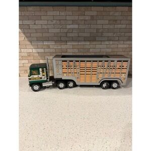 vintage Nylint pressed-steel GMC Astro 95 car transporter. A nice Hauler